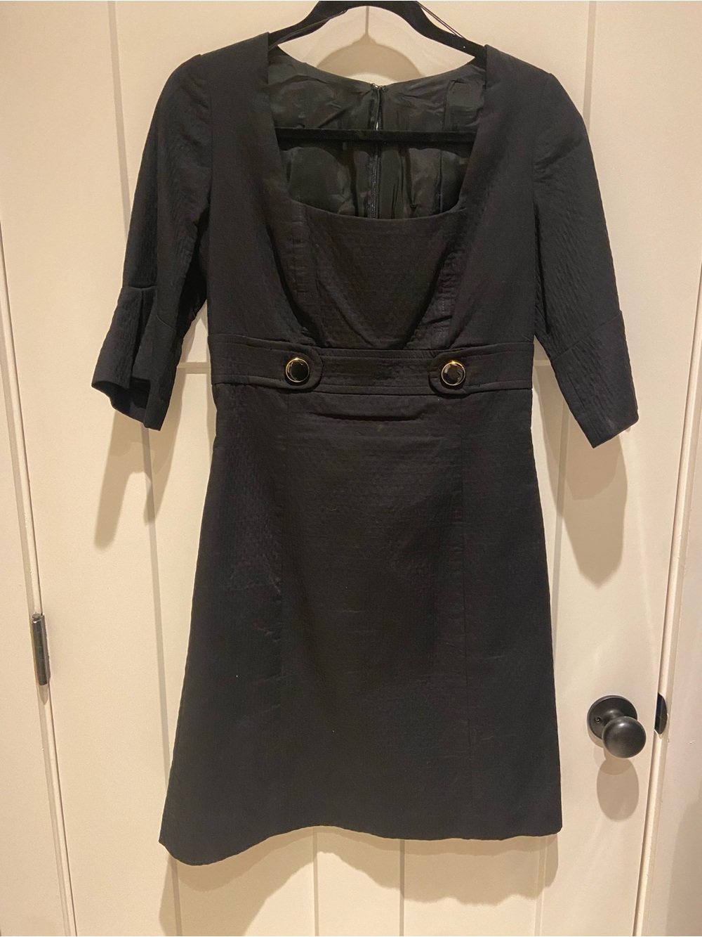 Black Short-Sleeve Dress with Decorative Buttons and Pleated Flounce Sleeves